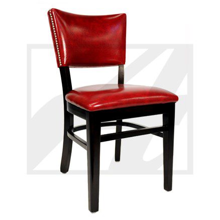 A red cushioned wooden chair with a black frame.