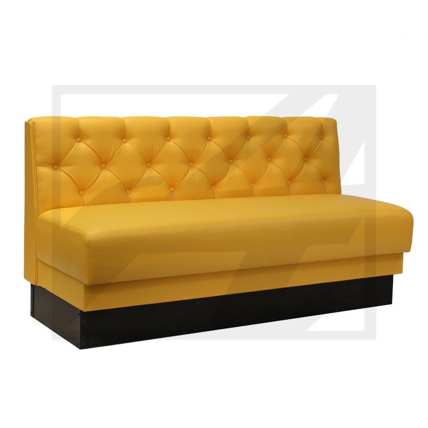 Modern mustard yellow tufted sofa with black base.