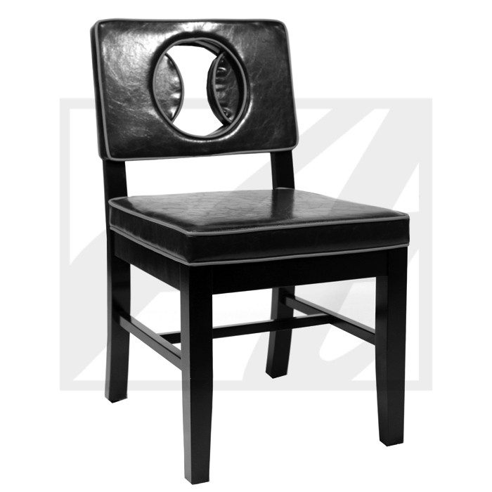 Black wooden chair with a circular cutout in the backrest.