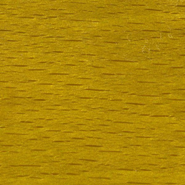 Close-up of a textured yellow surface with subtle brown streaks.