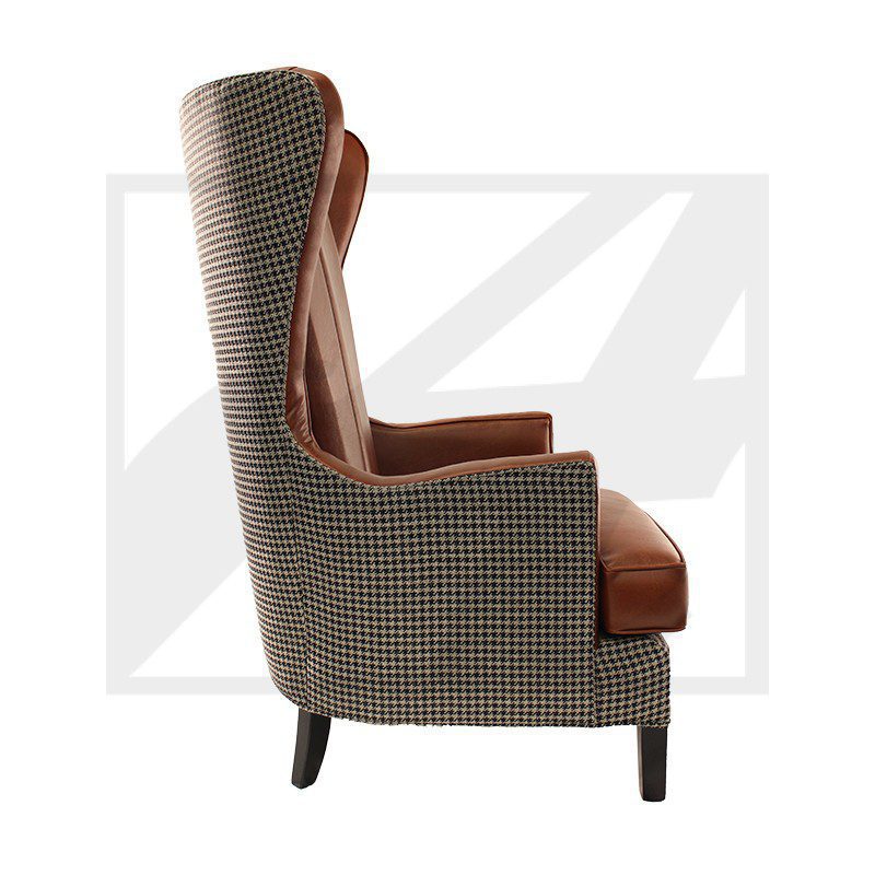 Side view of a modern high-back armchair with patterned upholstery.