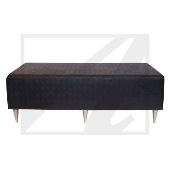 A modern black ottoman with angled legs.