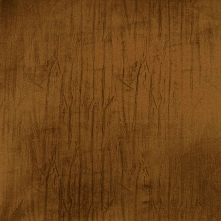 Brown textured surface with subtle scratches and marks.