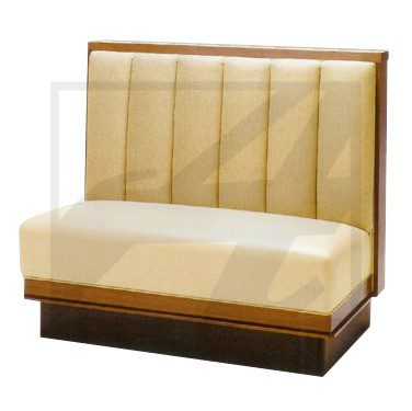A beige upholstered restaurant booth with a wooden base.