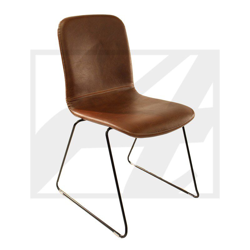 Brown leather chair with metal sled legs.