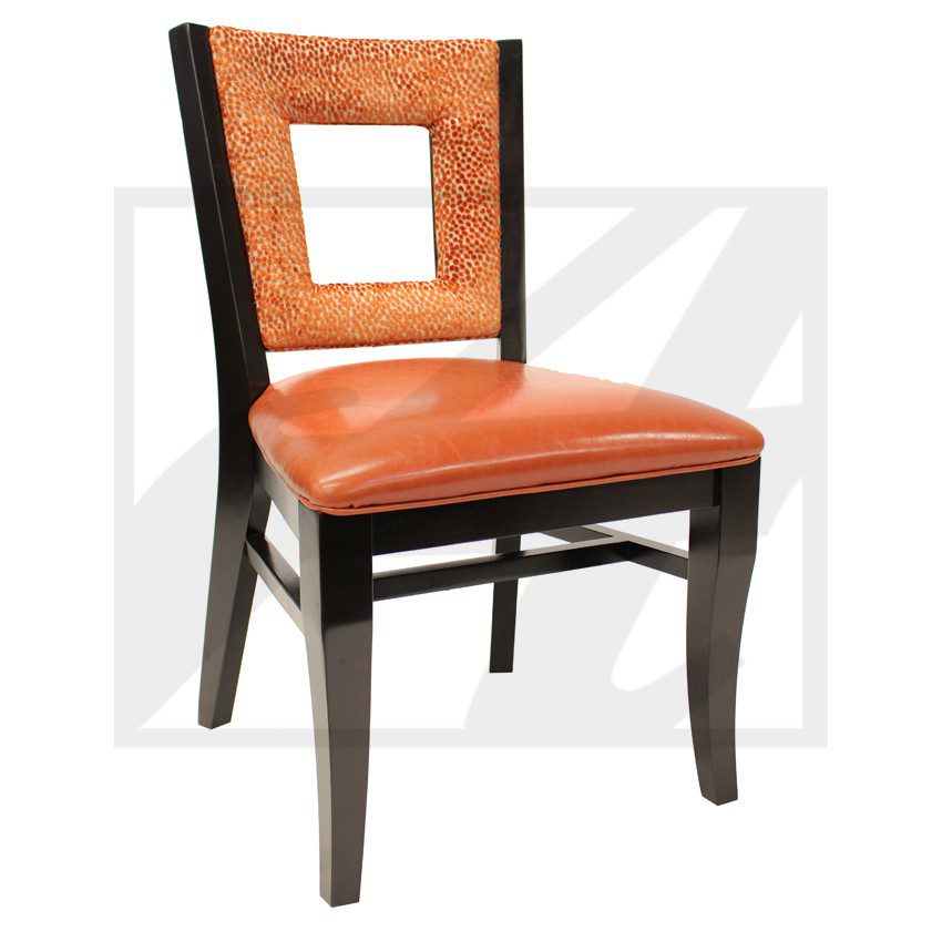 Wooden chair with leather seat and unique backrest design.