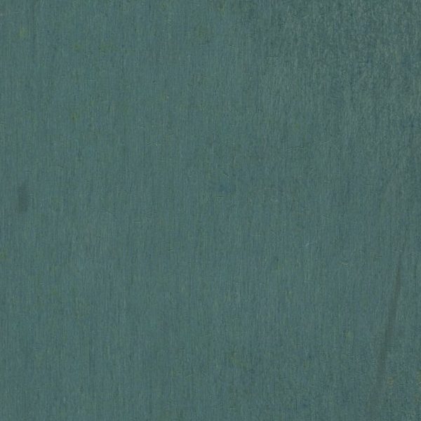 Close-up of a textured teal surface with subtle vertical streaks.