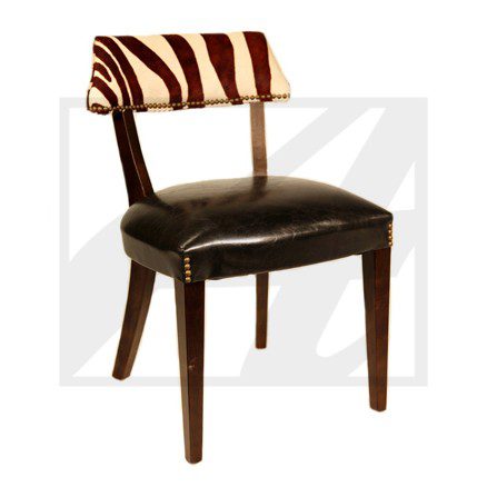 Wooden chair with leather seat and zebra-patterned backrest.
