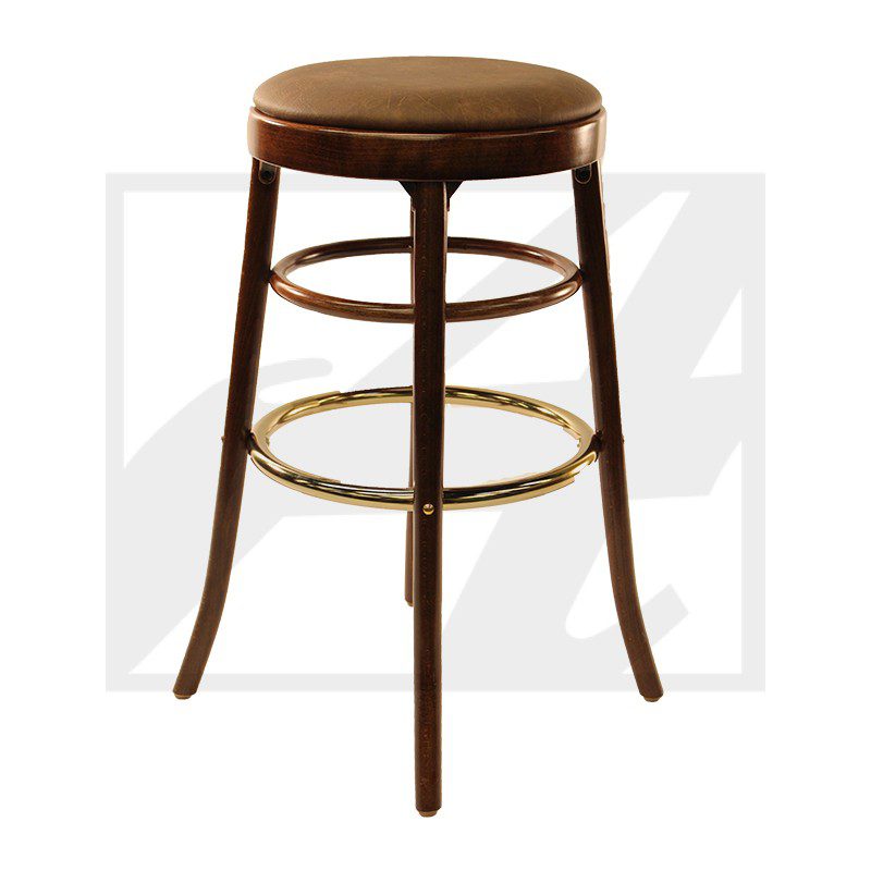Wooden bar stool with a round cushioned seat and brass footrest.