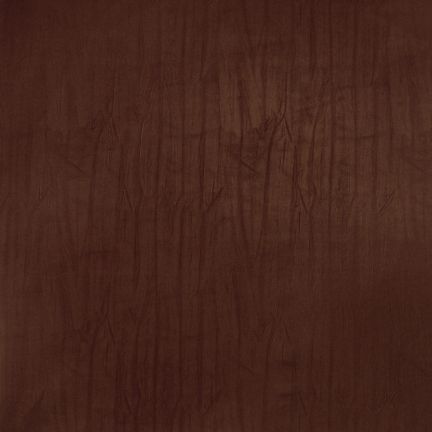 Close-up of dark brown textured leather surface.