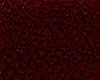 A dark red and black abstract pattern with flowing lines and shapes.
