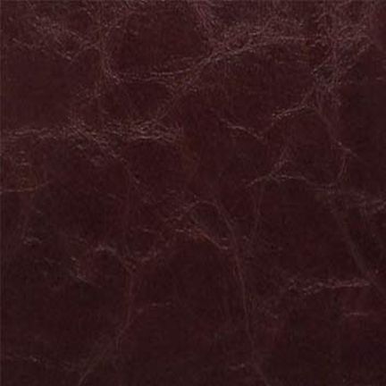 Close-up of dark brown textured leather surface.
