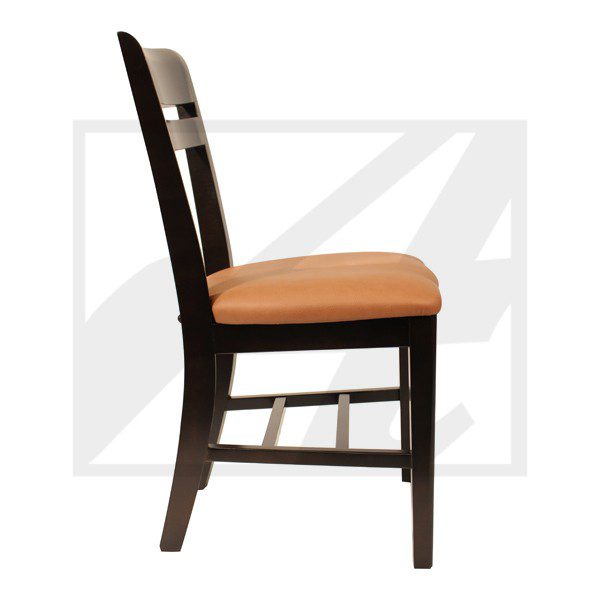 Side view of a wooden chair with an orange cushion.