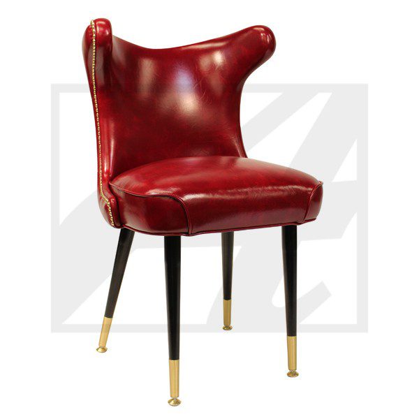 Elegant red leather chair with curved back and gold-tipped legs.