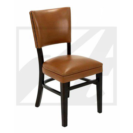Brown leather upholstered chair with black wooden legs.