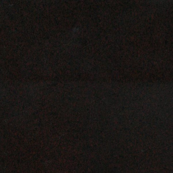 A plain dark textured surface, possibly fabric or paper.