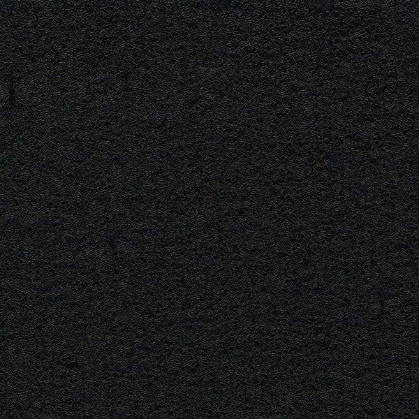 Black textured surface with a grainy pattern.