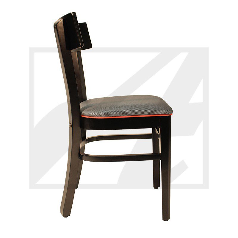 Side view of a wooden chair with a cushioned seat and backrest.