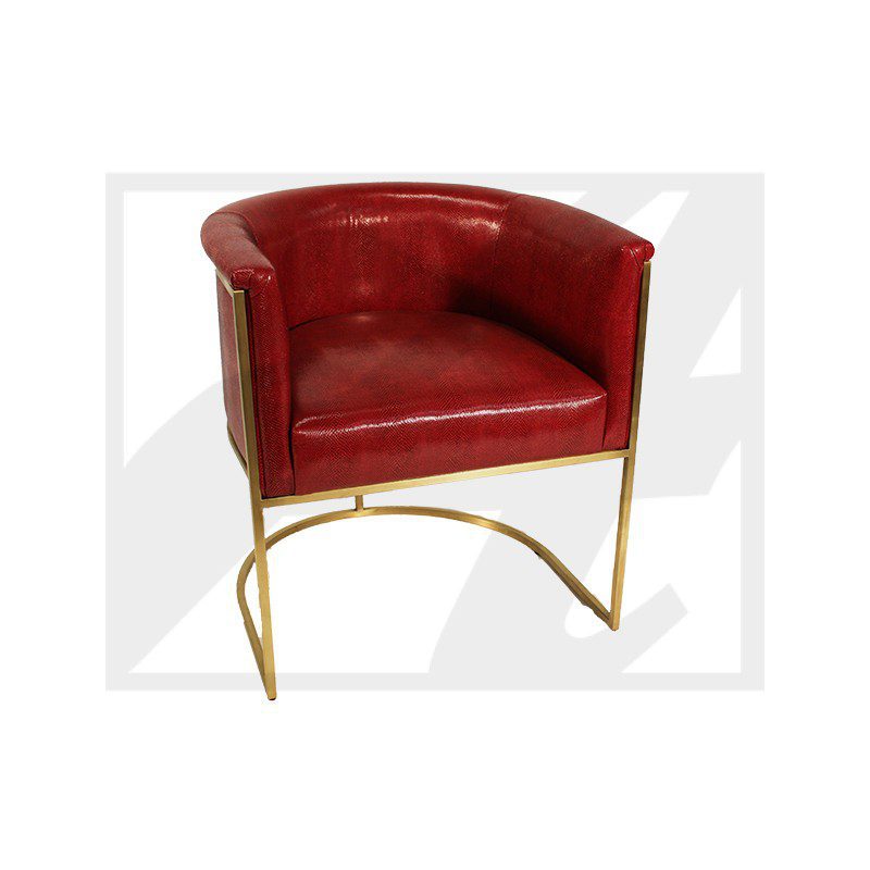 Red leather armchair with gold metal frame.