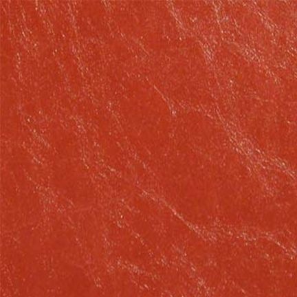 Close-up of textured red leather surface.