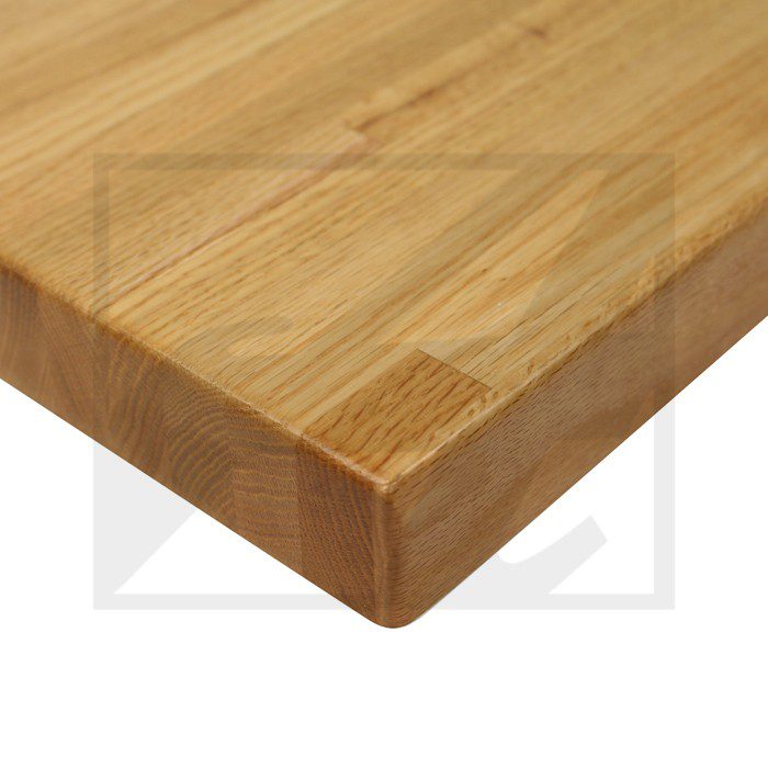 Close-up of a wooden tabletop corner with smooth finish.