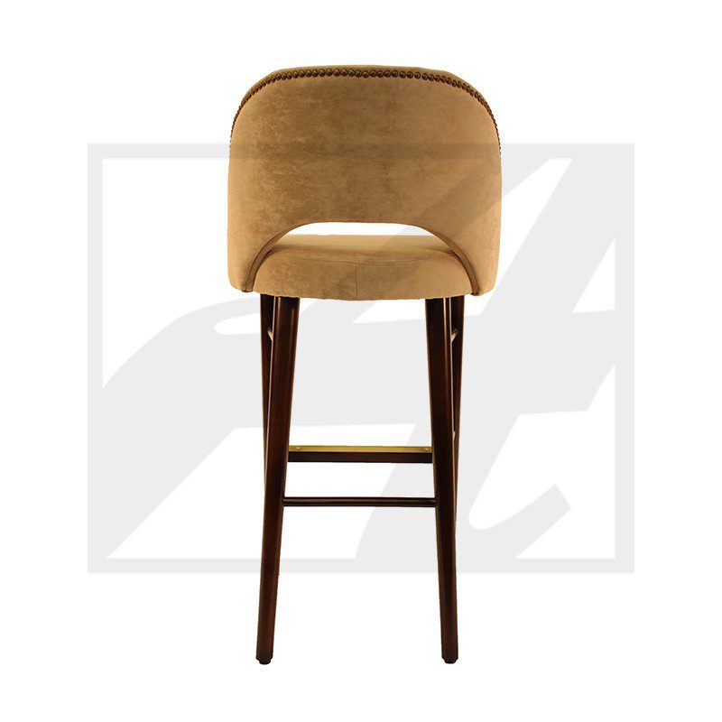 Modern bar stool with beige upholstery and wooden legs.