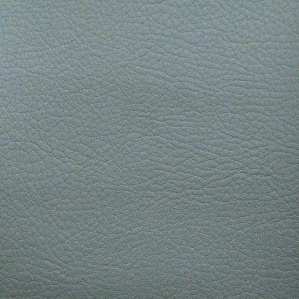 Close-up of gray leather texture with fine grain.