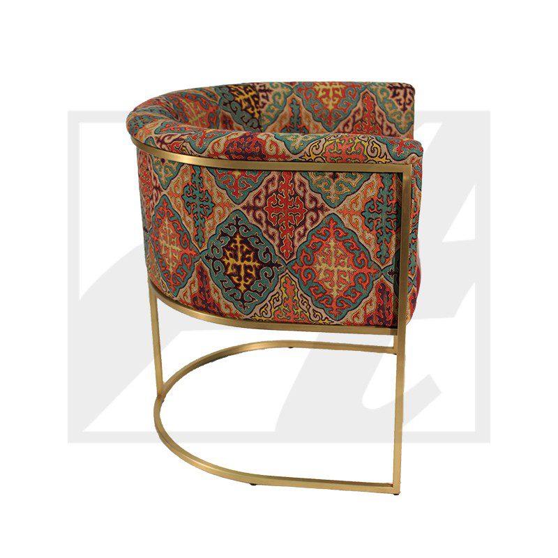 Elegant chair with colorful patterned upholstery and gold metal frame.