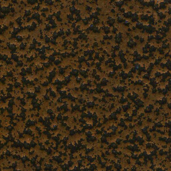 Close-up of a textured brown and black speckled surface.