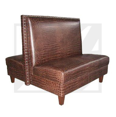 Brown faux leather armless bench with wooden legs.