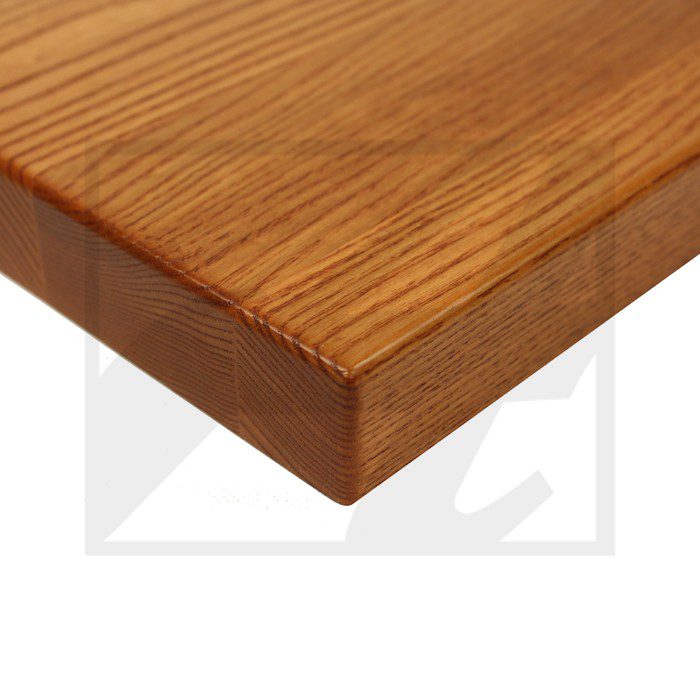 Close-up of a polished wooden board corner.