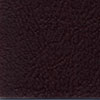 Close-up of a textured dark brown surface.