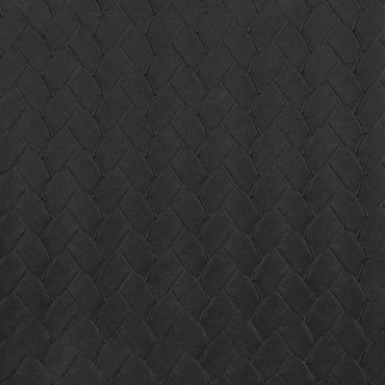Black textured surface with a subtle zigzag pattern.