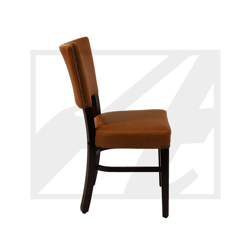 Side view of a brown upholstered chair with dark wooden legs.