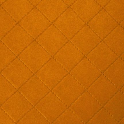 Orange quilted fabric with diamond stitching pattern.