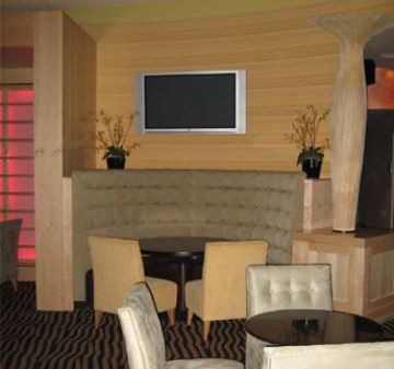 Cozy dining area with cushioned seating and modern decor.