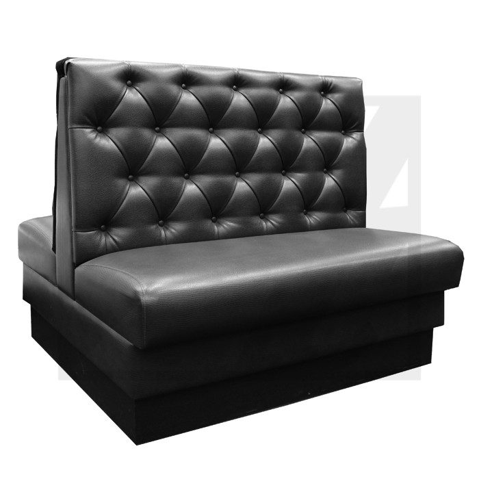 Black leather tufted booth seating with high backrest.