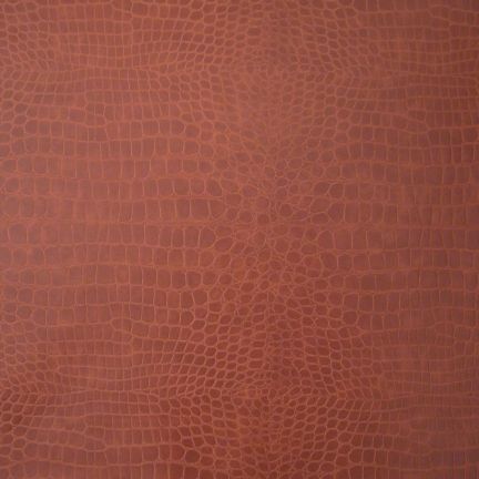 Close-up of brown leather texture with natural grain patterns.