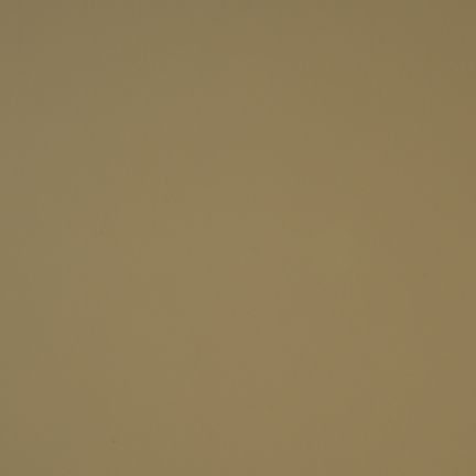 Plain beige wall with a smooth texture.