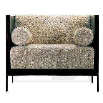 Modern beige armchair with cylindrical armrests and black frame.