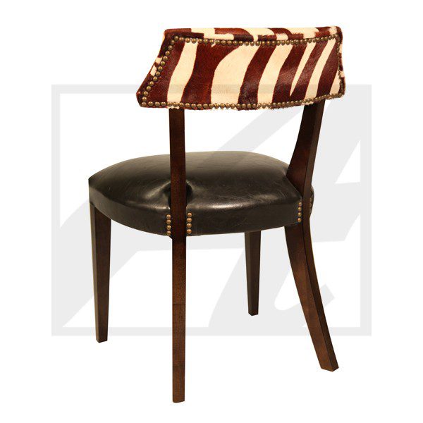 Modern chair with a wooden frame and leather seat.