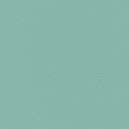 A textured teal surface with a subtle pattern.