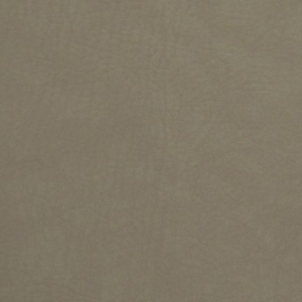 Close-up of a textured beige fabric surface.
