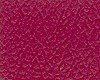 Close-up of a textured pink fabric with intricate patterns.