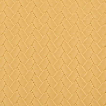 Textured beige surface with a subtle geometric pattern.