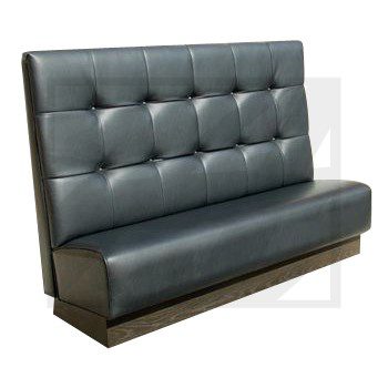 Modern black leather tufted booth seating with high backrest.