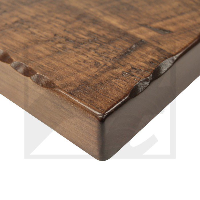 Close-up of a wooden table edge with finger joint details.