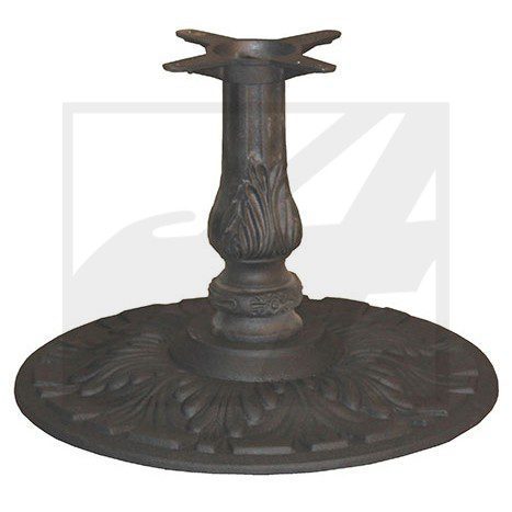 Antique metal candlestick holder with ornate design.
