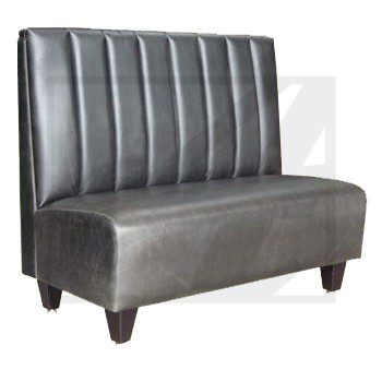 Modern gray upholstered booth seating with vertical stitching and wooden legs.