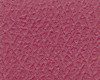 Close-up of textured pink fabric with intricate patterns.